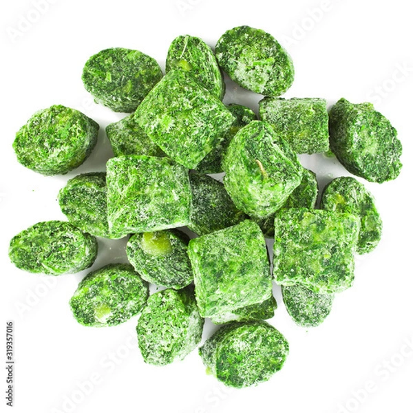 Fototapeta Healthy vegetarian frozen spinach isolated on white background. Top view.