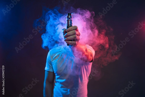 Obraz Vaping e-liquid from an electronic cigarette