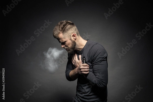 Fototapeta Vaping e-liquid from an electronic cigarette