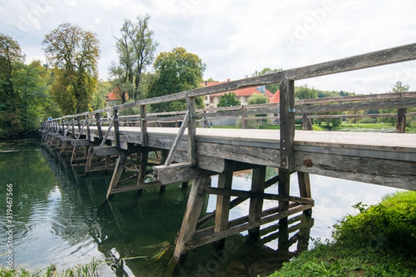 Obraz wooden bridge over the river