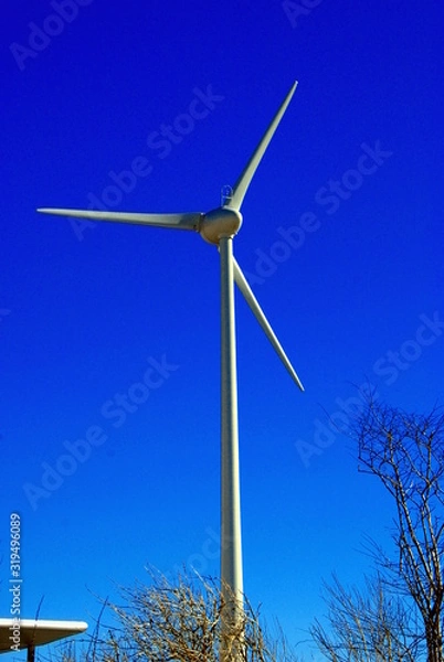 Obraz wind turbine on blue sky