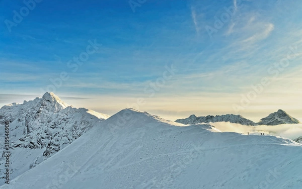Obraz Sun and fog in Kasprowy Wierch of Zakopane in Tatra Mounts in winter. Zakopane is a town in Poland in Tatra Mountains. Kasprowy Wierch is a mount in Zakopane and is the most popular ski area in Poland