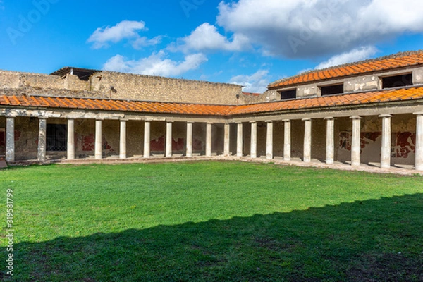 Fototapeta Italy, Naples, Oplontis, view of the arcades with columns in the villa of Poppea in the archaeological area of ​​Torre Annunziata