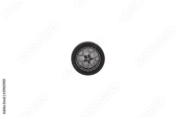 Fototapeta Top view alloy wheel with (Tire or tyre) of car model plastic kit isolated on white background..