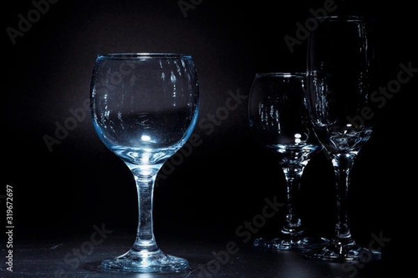 Fototapeta Empty  glasses for drinks on dark background