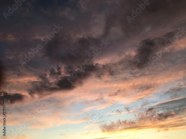 Obraz Beautiful Clouds with Dynamic Lighting Near Sunset