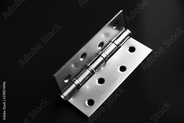 Obraz Door hinges, hold the door, on a black background