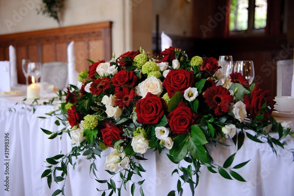 Obraz Red roses decorate wedding table