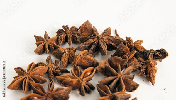 Fototapeta Oriental spice star anise on kicthen table