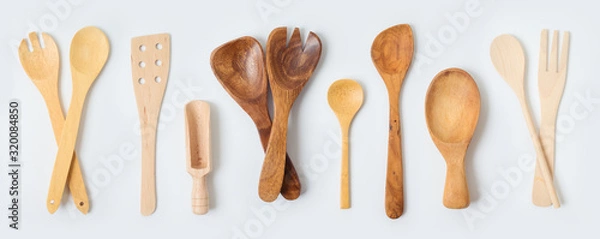 Fototapeta Wooden kitchen utensils collection on white background. Cooking or baking mock up for design.