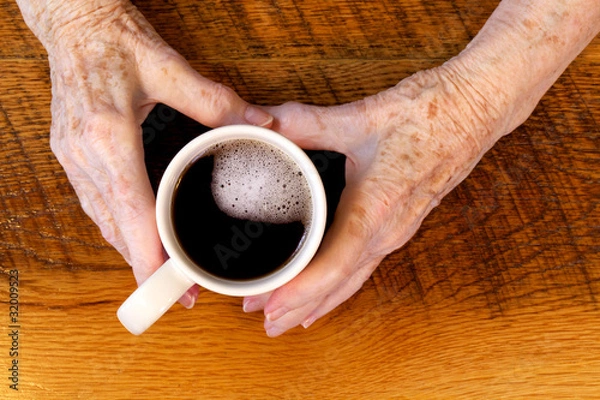 Fototapeta Arthritic Hands & Coffee Cup