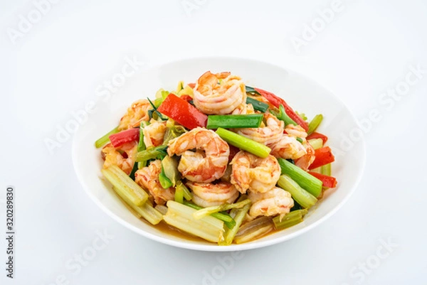 Fototapeta Stir-fried shrimp with celery in a dish on white background