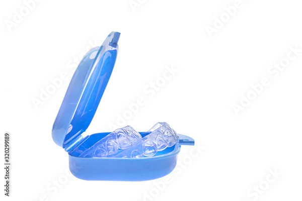 Fototapeta Set of individual dental trays for whitening in blue container