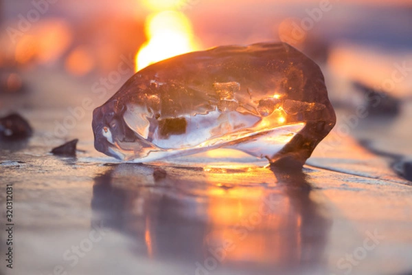 Fototapeta chunks of ice in the light of the setting sun