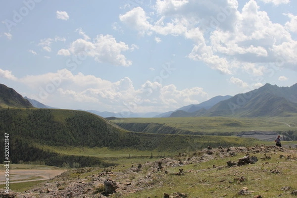 Fototapeta landscape with mountains and clouds