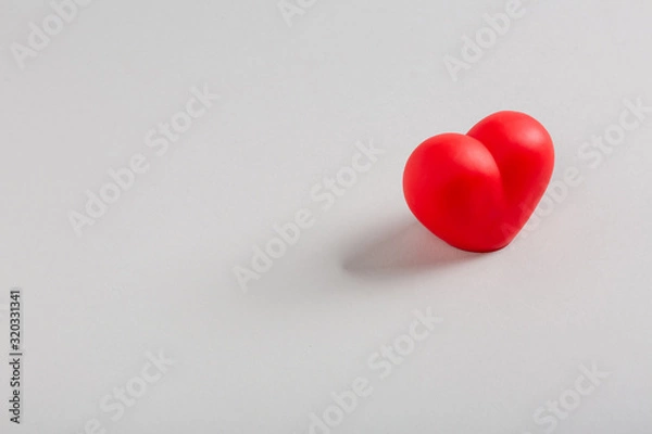 Fototapeta Top view on red heart isolated on a white background. Valentine's day concept. 14 february love day