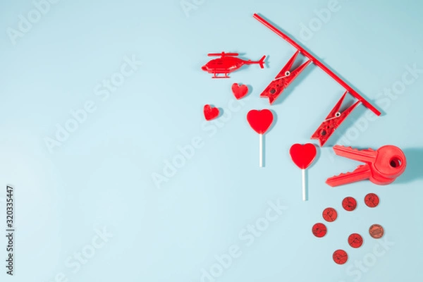 Fototapeta Valentine's Day background with red Heart Shaped,Rose, and Decorative red on pastel blue background. Love and Valentine's Day concept with copy space for invitation, posters, brochure, banners.