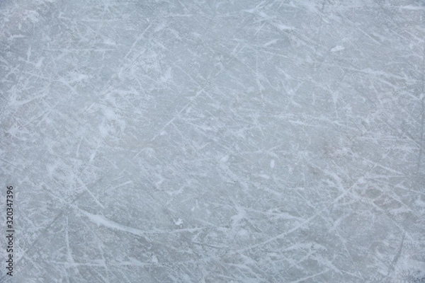 Fototapeta texture of traces of ice skates on the ice