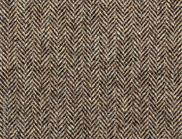 Fototapeta Beige woolen fabric striped zigzag. Classic Herringbone tweed, Wool Background Texture. Coat close-up. Expensive men's suit fabric. High resolution