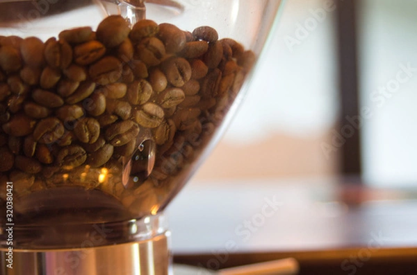 Obraz Coffee Beans in a Grinder