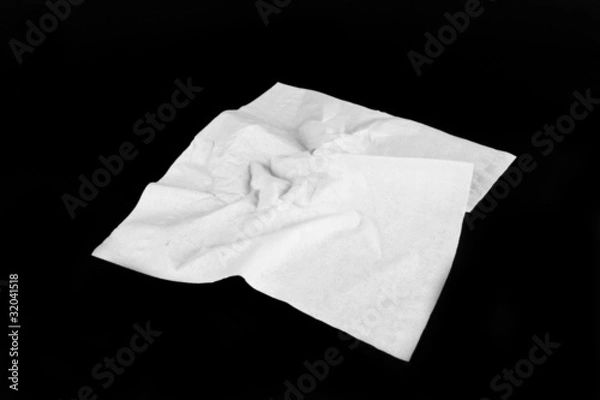 Fototapeta Napkin, A wrinkled napkin on black  screen.