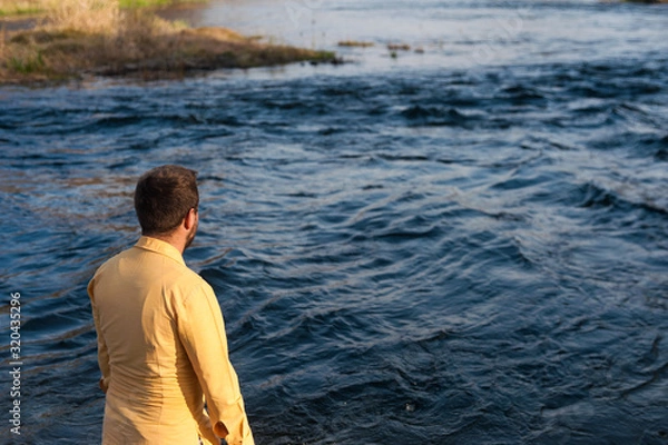 Fototapeta man drowning in a river