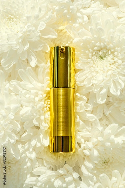 Obraz Cosmetic Bottle on white flower