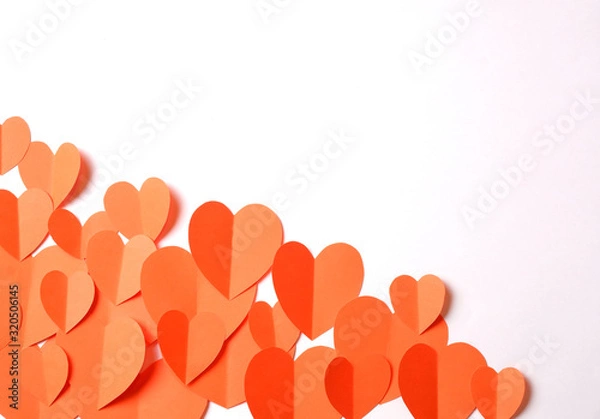 Fototapeta Orange paper hearts cutouts on white background with free space for your text