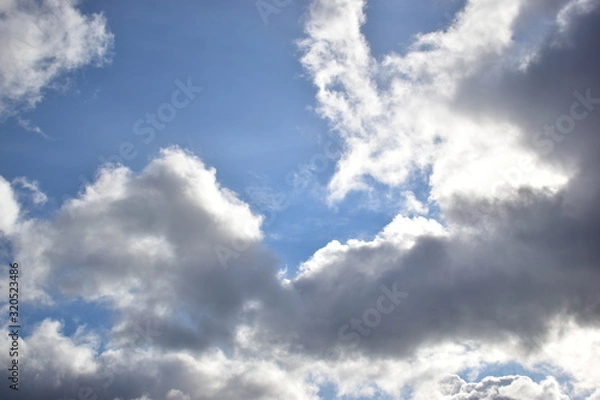 Obraz clouds against a blue sky