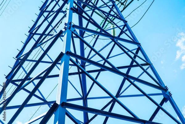 Fototapeta Telecommunication towers include of radio microwave and television antenna system with cloud blue sky and sun ray. Antenna tower, low angle view.