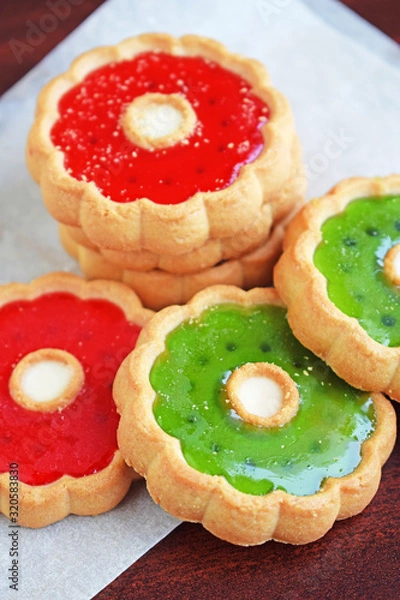 Obraz Cookies with marmalade berry filling. Crispy and crumbly delicious cookies with natural ingredients.