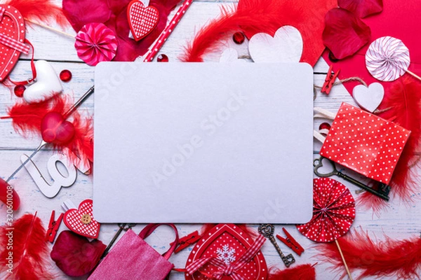 Fototapeta Wooden white background with red hearts and gifts. The concept of Valentine Day whith empty blank for text. Top view copy space.