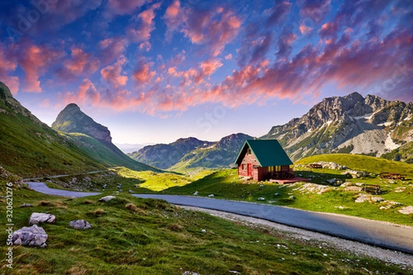 Obraz Amaizing sunset view on Durmitor mountains, National Park, Mediterranean, Montenegro, Balkans, Europe.  Bright summer view from Sedlo pass. Instagram picture. Way through the mountain. Colored clouds.