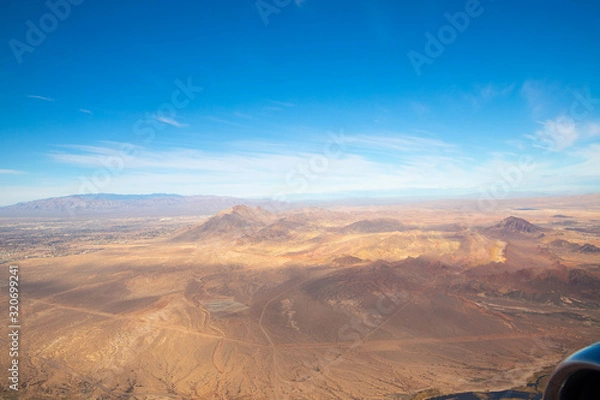 Fototapeta View from airplane on Earth surface.