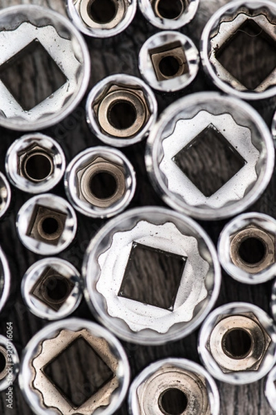 Fototapeta Socket wrench tool heads for loosening screws, bolts and nuts.