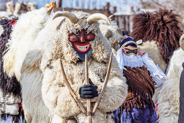 Obraz Unidentified people in masks; participants at the Mohacsi Busojaras, it is a carnival for spring greetings (Intangible Cultural Heritage of Humanity of the UNESCO).