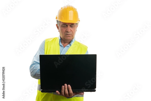 Obraz Engineer looking at personal computer