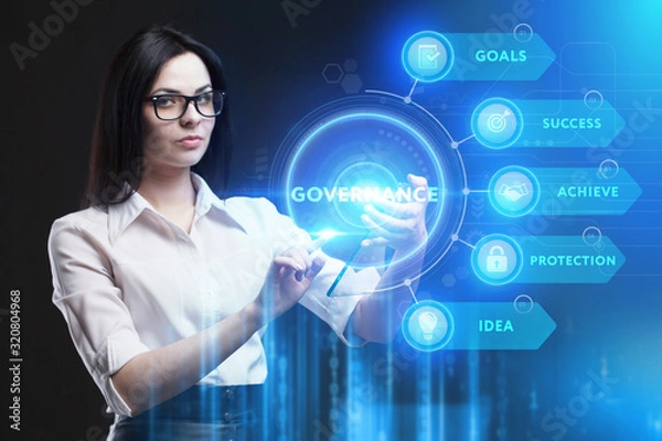 Fototapeta Business, Technology, Internet and network concept. Young businessman working on a virtual screen of the future and sees the inscription: Governance