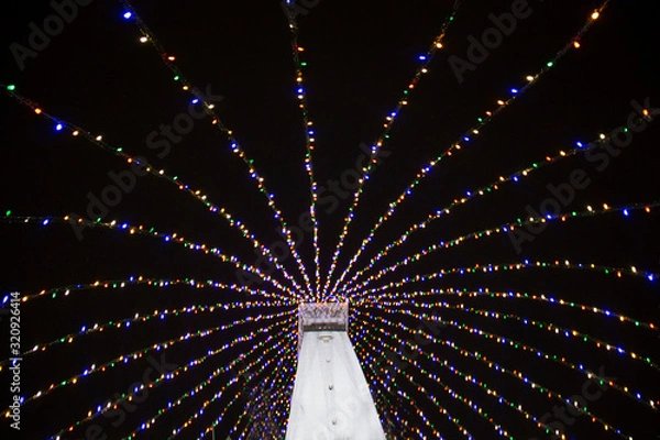Obraz Colorful lights on a statue
