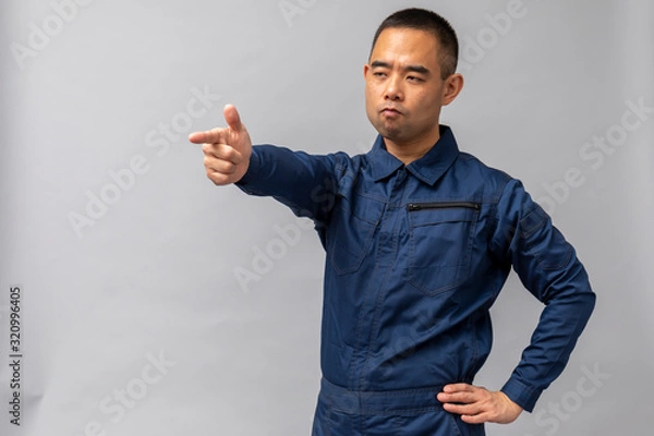 Fototapeta ツナギ姿の男性