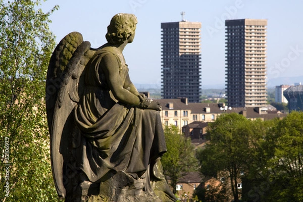 Obraz Urban angel contemplating high-rise tower blocks