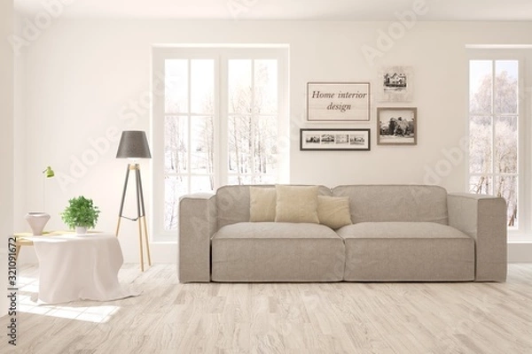 Fototapeta Stylish room in white color with sofa and winter landscape in window. Scandinavian interior design. 3D illustration