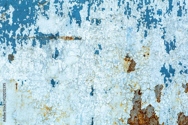 Fototapeta Old peeling paint texture on a wooden wall background. Pattern and texture of old dried paint and stucco on a rough surface