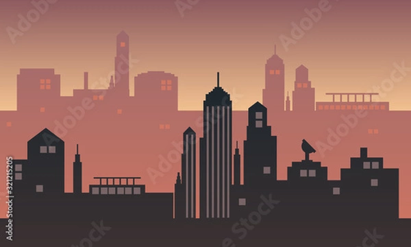Fototapeta Twilight atmosphere in an urban setting with many buildings