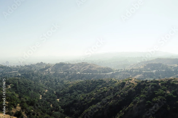 Fototapeta Panoramic view of the Hollywood hills from the beautiful Griffith Observatory in Los Angeles