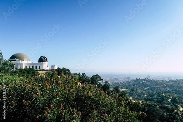 Fototapeta Griffith Observatory in Hollywood Los Angeles, view of the telescope sign