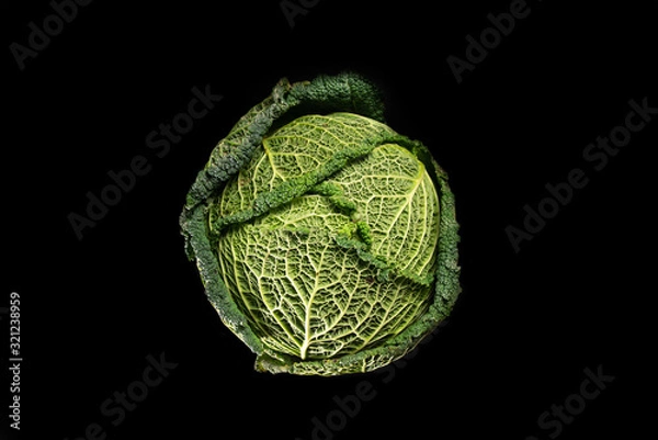Fototapeta  Green cabbage on black background