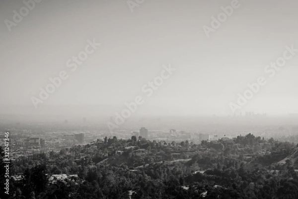 Fototapeta Black and white photography of the panoramic view of LA downtown and suburbs from the Griffith Observatory in Los Angeles