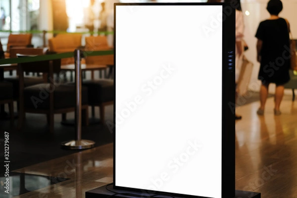 Fototapeta blank advertising billboard and emergency exit sign at airport,Mock up Poster media template Ads display in Subway station escalator