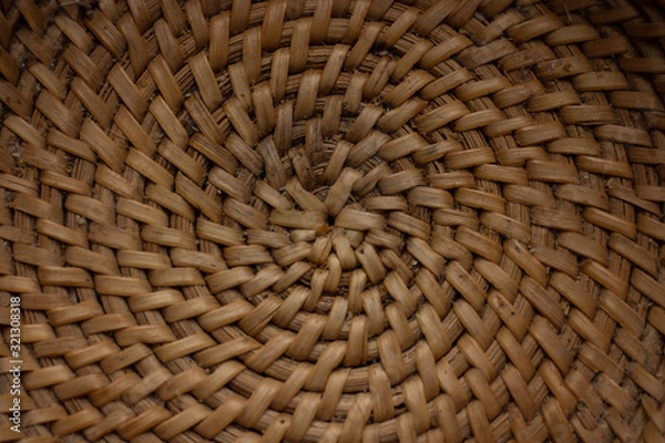 Obraz The bottom of a small wicker basket close-up